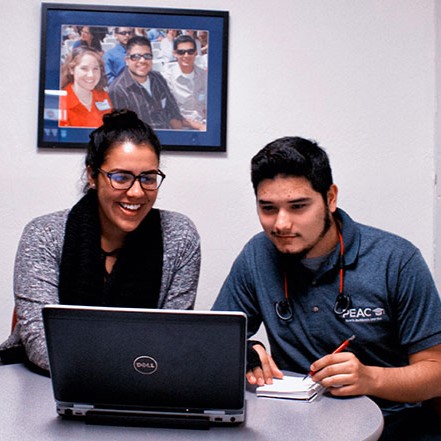 Program advisor working with student.